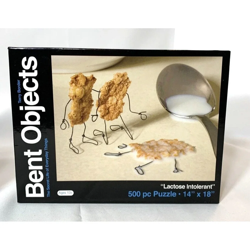 Bent Objects Puzzles x2 Terry Border 500 Piece Mr. Kiwi Lactose Intolerant NEW